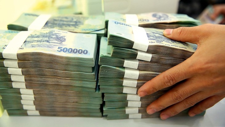 Lãi suất ngân hàng giảm, tiền cho vay vẫn "ế"? - Ảnh 1. Lãi suất ngân hàng giảm, tiền cho vay vẫn "ế"? - Ảnh 1.