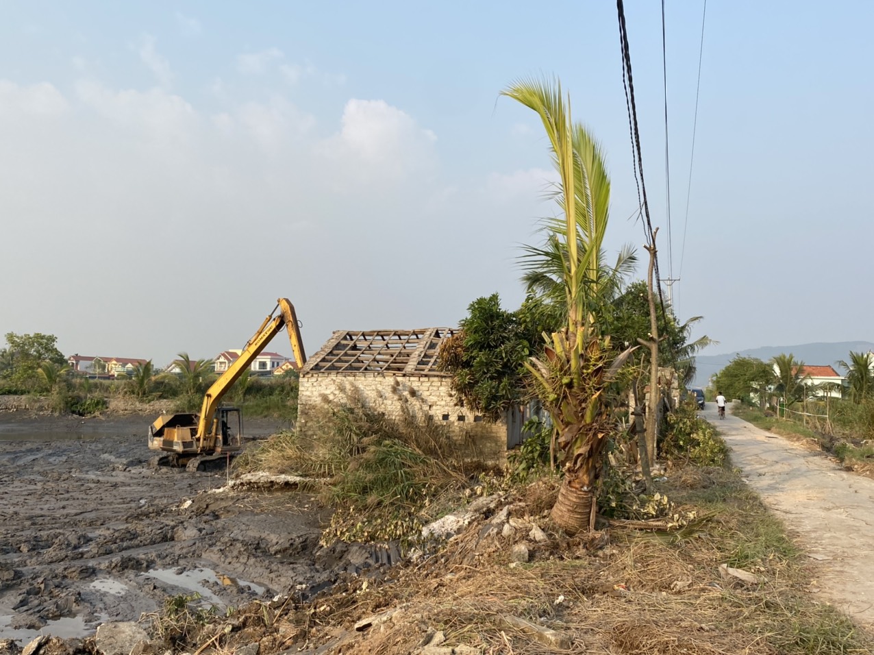 Quảng Ninh: D&acirc;n đồng l&ograve;ng nhận tiền, b&agrave;n giao mặt bằng thi c&ocirc;ng đường dẫn cầu Bến Rừng - Ảnh 2.