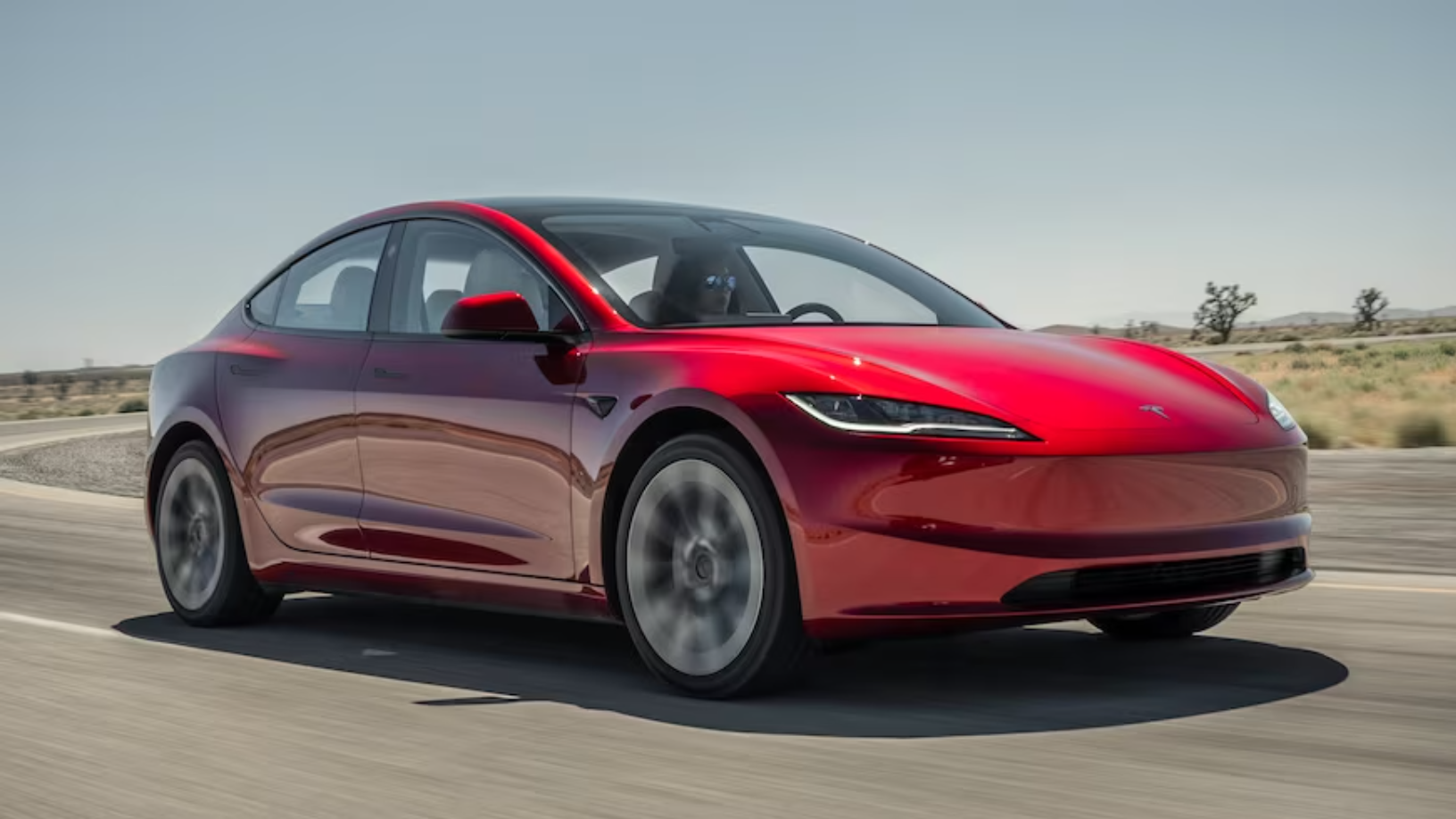 Model 3 của Tesla nổi bật với t&iacute;nh năng đ&egrave;n b&aacute;o điểm m&ugrave; - Ảnh 1.