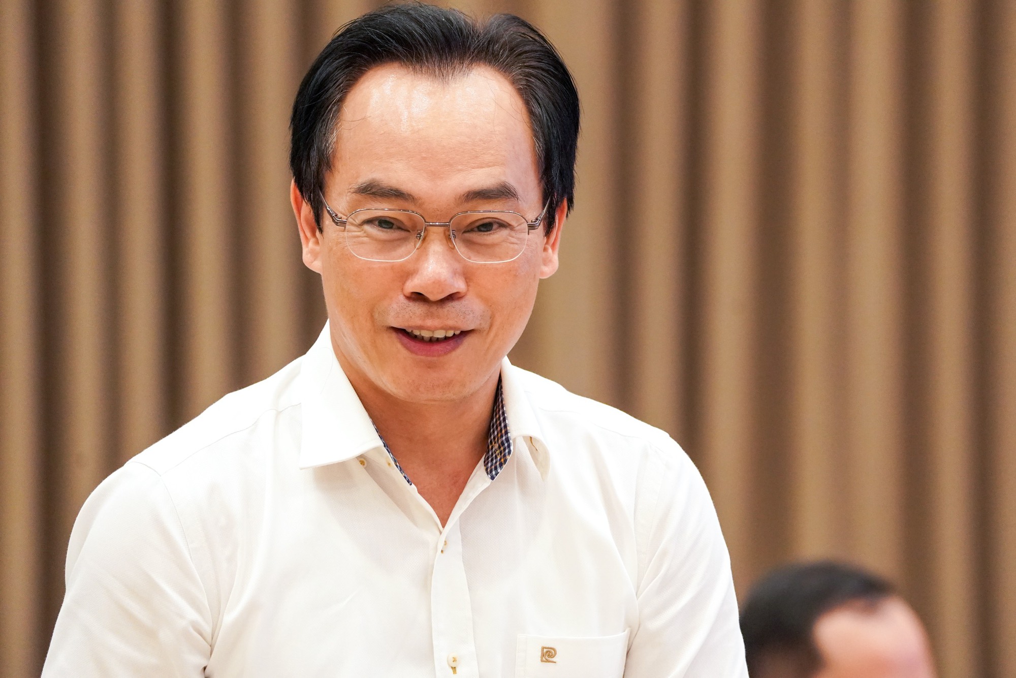 Bỏ thi thăng hạng vi&ecirc;n chức tiết kiệm chi ph&iacute;, giảm &aacute;p lực  - Ảnh 2.