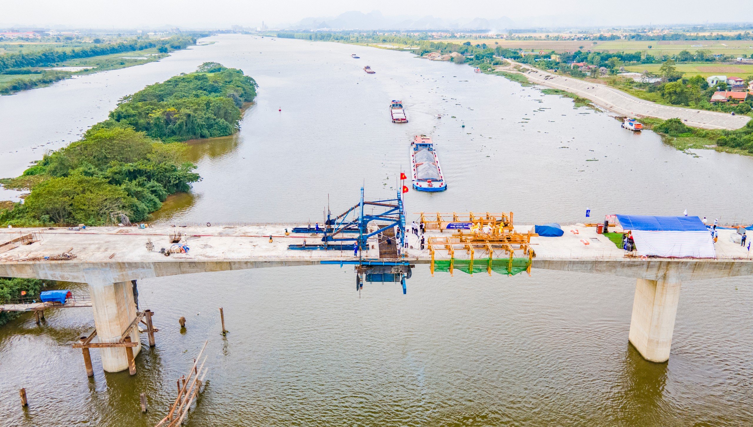 Rốt r&aacute;o r&agrave; so&aacute;t, điều chỉnh định mức x&acirc;y dựng dự &aacute;n giao th&ocirc;ng- Ảnh 2.