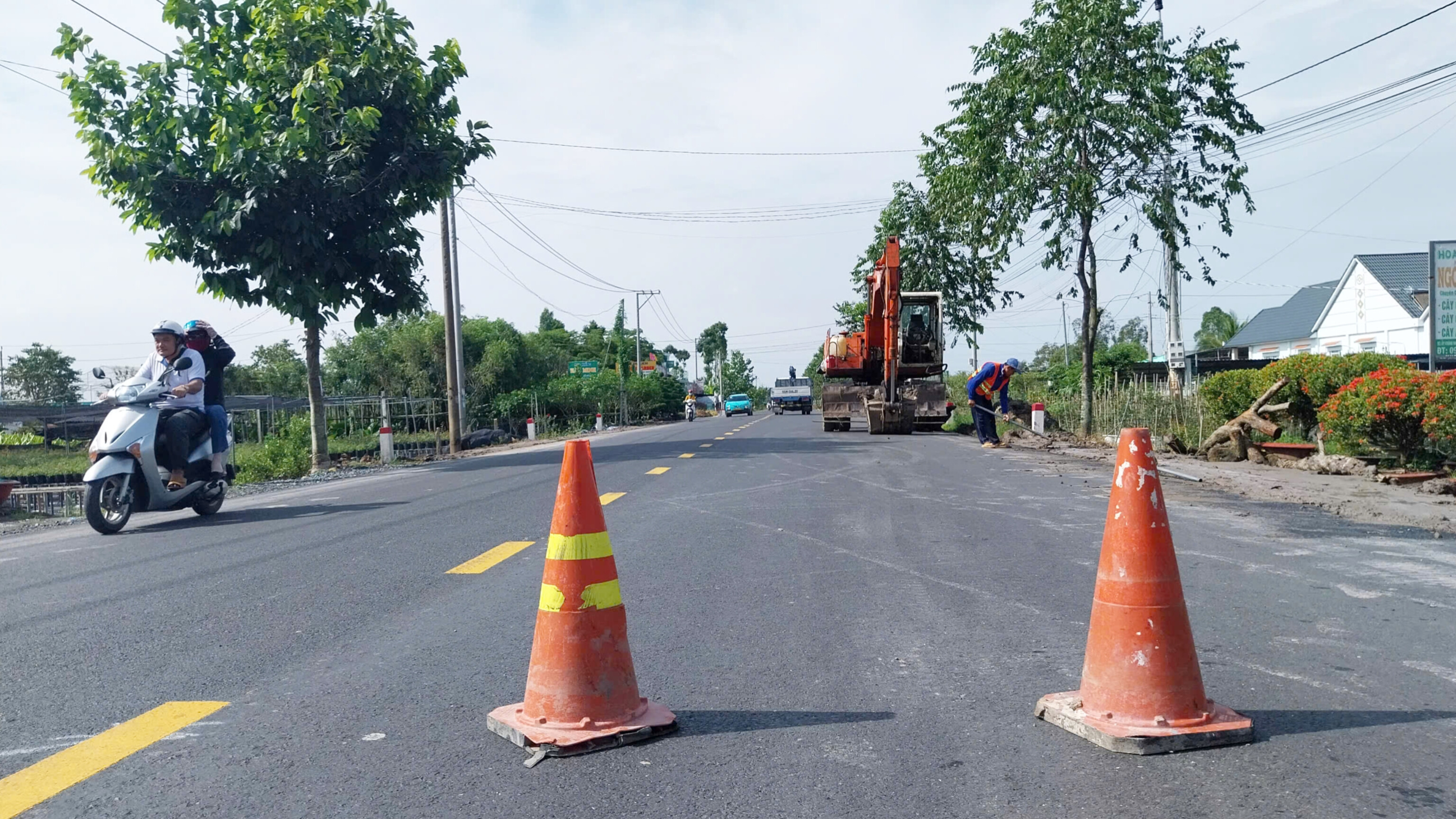 Đồng Tháp: Thảm nhựa bằng phẳng đường đầu cầu Sa Đéc 2- Ảnh 4. Đồng Tháp: Thảm nhựa bằng phẳng đường đầu cầu Sa Đéc 2- Ảnh 4.