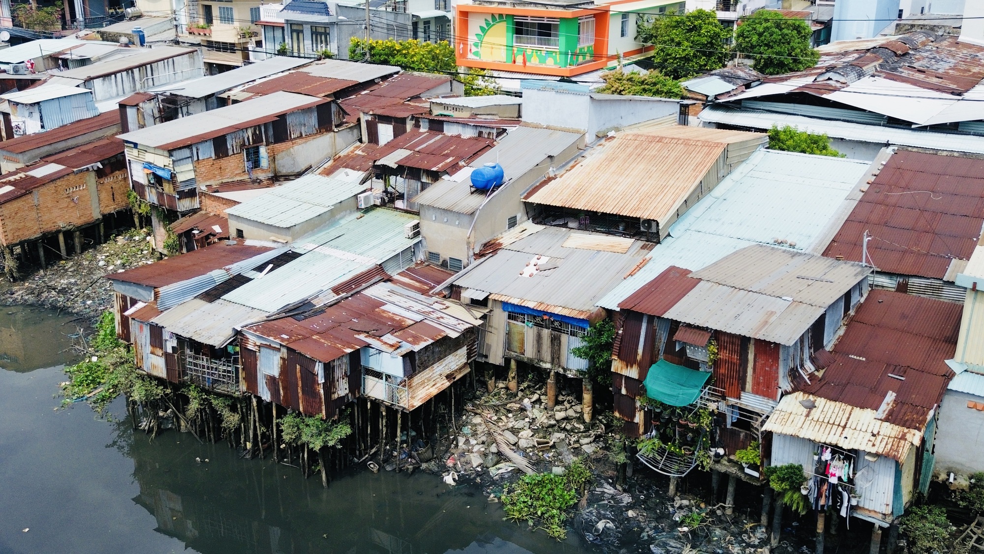 Người dân bờ Bắc kênh Đôi mong ngóng dự án triển khai để có cuộc sống mới- Ảnh 6. Người dân bờ Bắc kênh Đôi mong ngóng dự án triển khai để có cuộc sống mới- Ảnh 6.