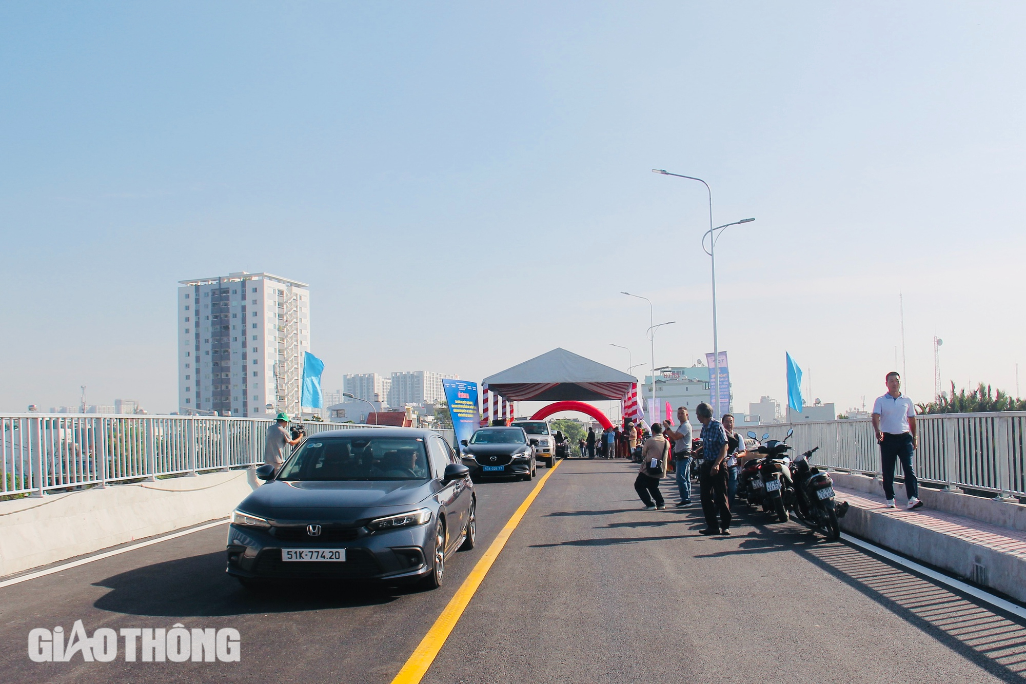 Thông xe cầu Phước Long, người dân khu nam TP.HCM bớt lo ùn tắc- Ảnh 12. Thông xe cầu Phước Long, người dân khu nam TP.HCM bớt lo ùn tắc- Ảnh 12.