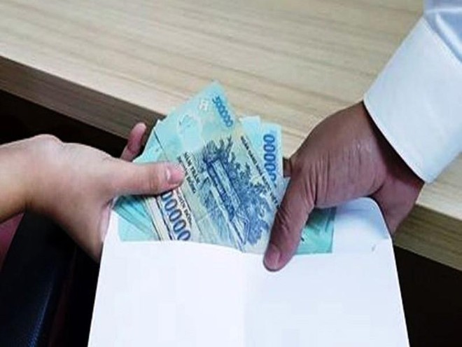 Bắt quả tang 1 thẩm ph&aacute;n ở Ki&ecirc;n Giang nhận tiền hối lộ- Ảnh 1.