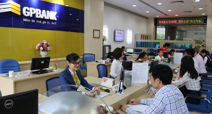Chuyển giao bắt buộc hai ng&acirc;n h&agrave;ng yếu k&eacute;m trước tết Nguy&ecirc;n đ&aacute;n- Ảnh 1.