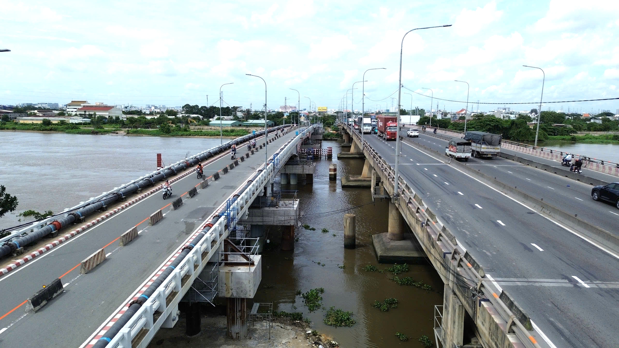 Ho&agrave;n tất k&iacute;ch n&acirc;ng tĩnh kh&ocirc;ng th&ocirc;ng thuyền cầu 11.000 tấn bắc qua s&ocirc;ng S&agrave;i G&ograve;n l&ecirc;n 7m- Ảnh 4.