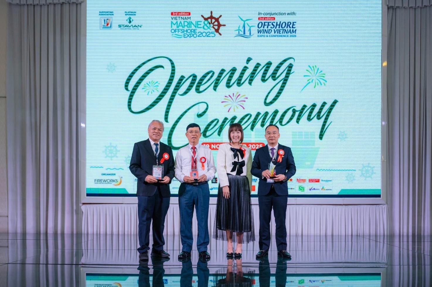 A group of people standing on a stage  AI-generated content may be incorrect.