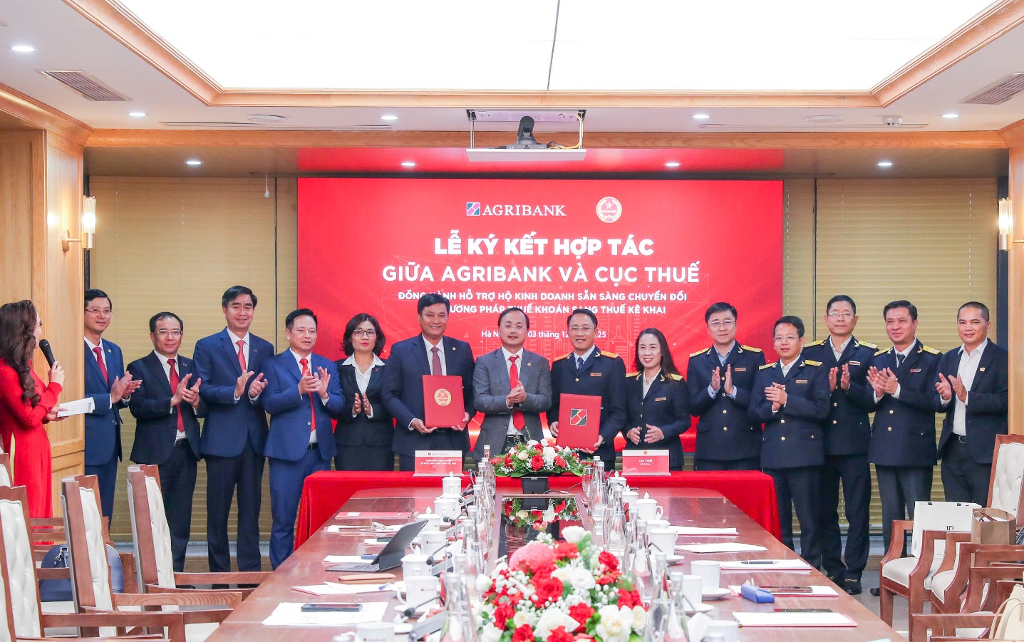 Agribank v&agrave; Cục Thuế đồng h&agrave;nh hỗ trợ hộ kinh doanh chuyển đổi sang thuế k&ecirc; khai- Ảnh 1.