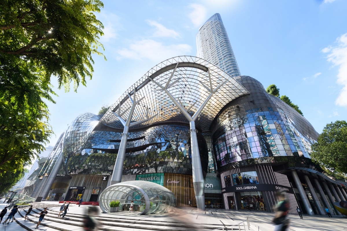 A building with glass walls and a glass roof  Description automatically generated