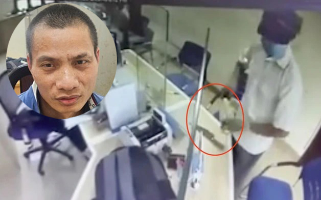 Nghi phạm cầm dao cướp ng&acirc;n h&agrave;ng ở H&agrave; Nội bị bắt- Ảnh 1.