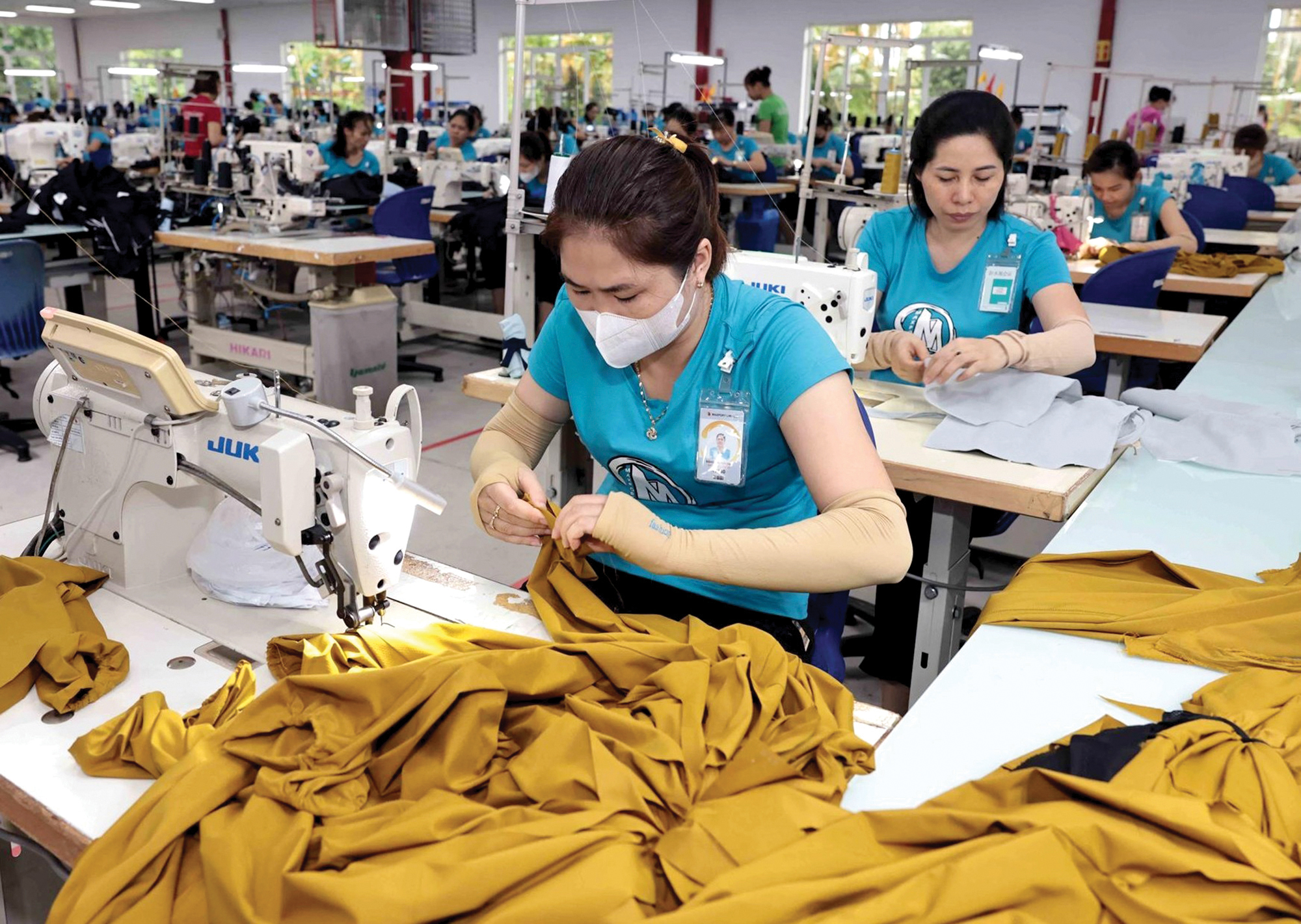 Doanh nghiệp ứng ph&oacute; việc &aacute;p thuế mới từ Mỹ- Ảnh 1.