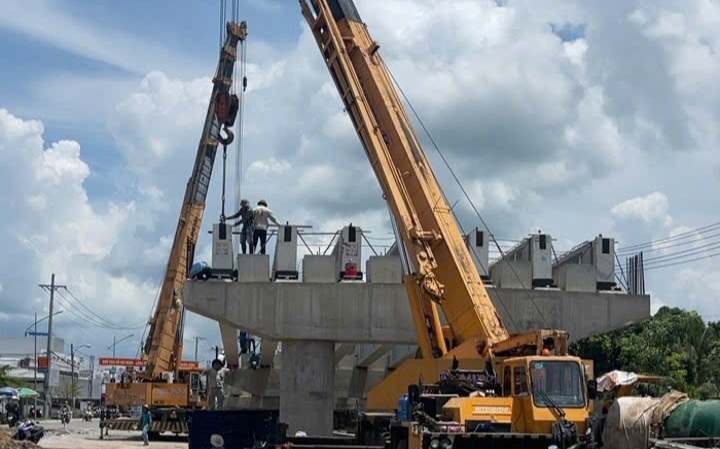 Kiên Giang: Cầu Vàm Xáng Thị Đội gác dầm 6/9 nhịp, quyết tâm về đích trước hạn- Ảnh 4. Kiên Giang: Cầu Vàm Xáng Thị Đội gác dầm 6/9 nhịp, quyết tâm về đích trước hạn- Ảnh 4.