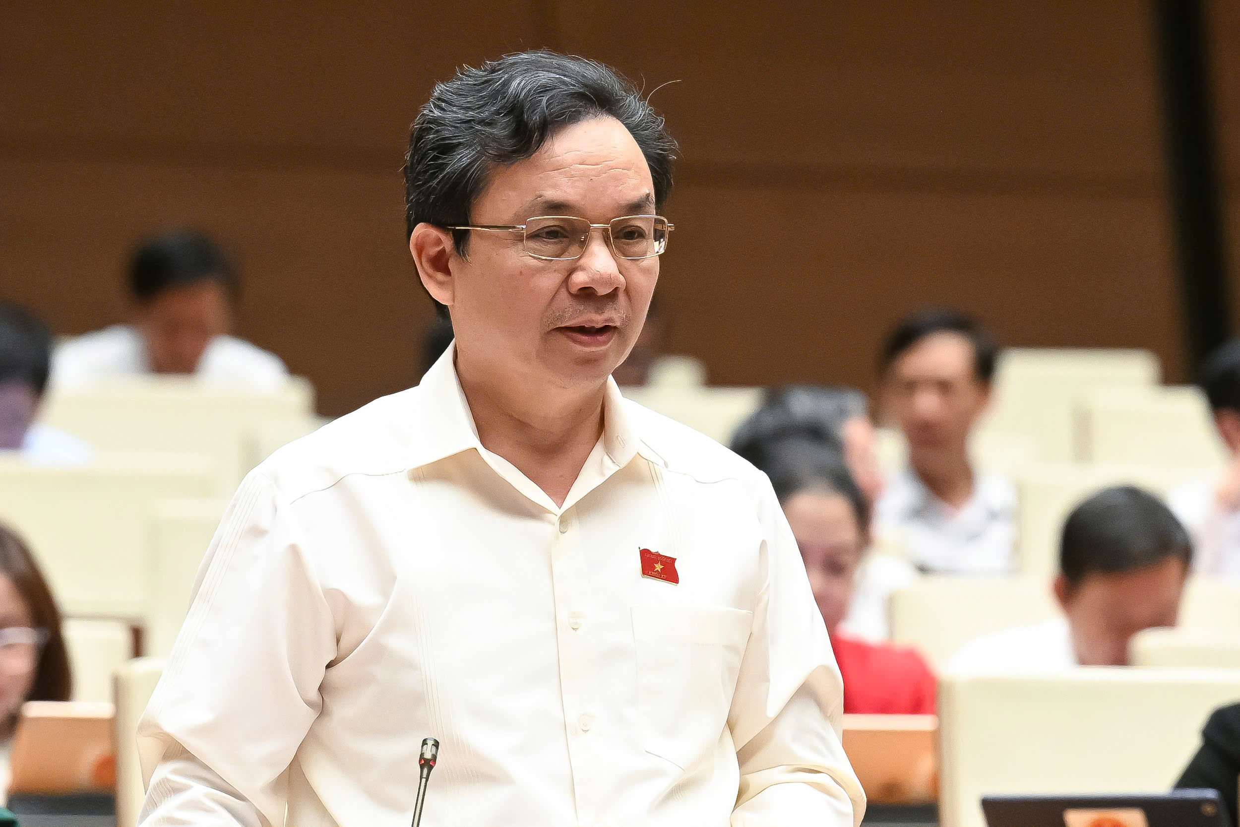 Bộ trưởng Trần Hồng Minh l&yacute; giải việc kh&ocirc;ng quy định gi&aacute; s&agrave;n nh&agrave; ở x&atilde; hội- Ảnh 1.