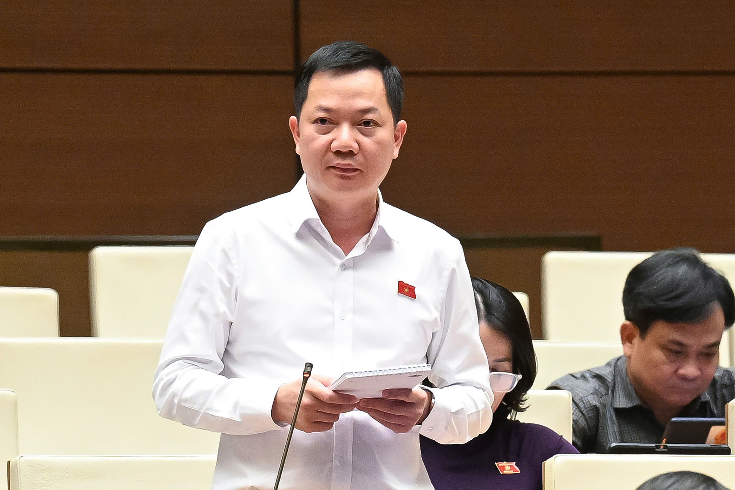 Bộ trưởng Trần Hồng Minh l&yacute; giải việc kh&ocirc;ng quy định gi&aacute; s&agrave;n nh&agrave; ở x&atilde; hội- Ảnh 3.