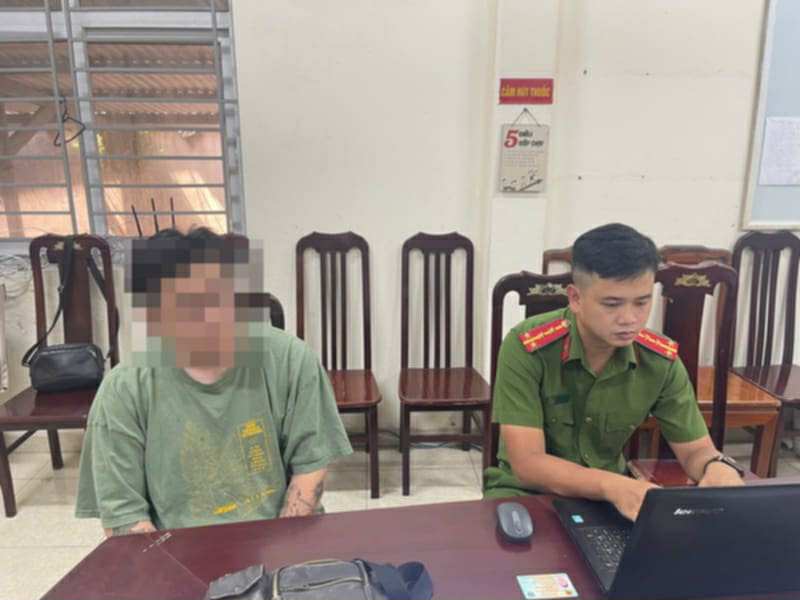 H&agrave; Nội: Triệu tập người đ&agrave;n &ocirc;ng xăm trổ đ&aacute;nh phụ nữ tại chung cư Sky Central - Ảnh 2.