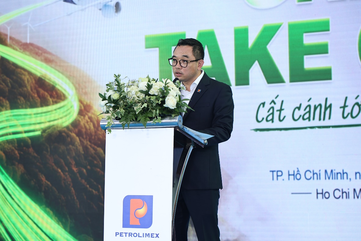 A person standing at a podium with flowers  AI-generated content may be incorrect.