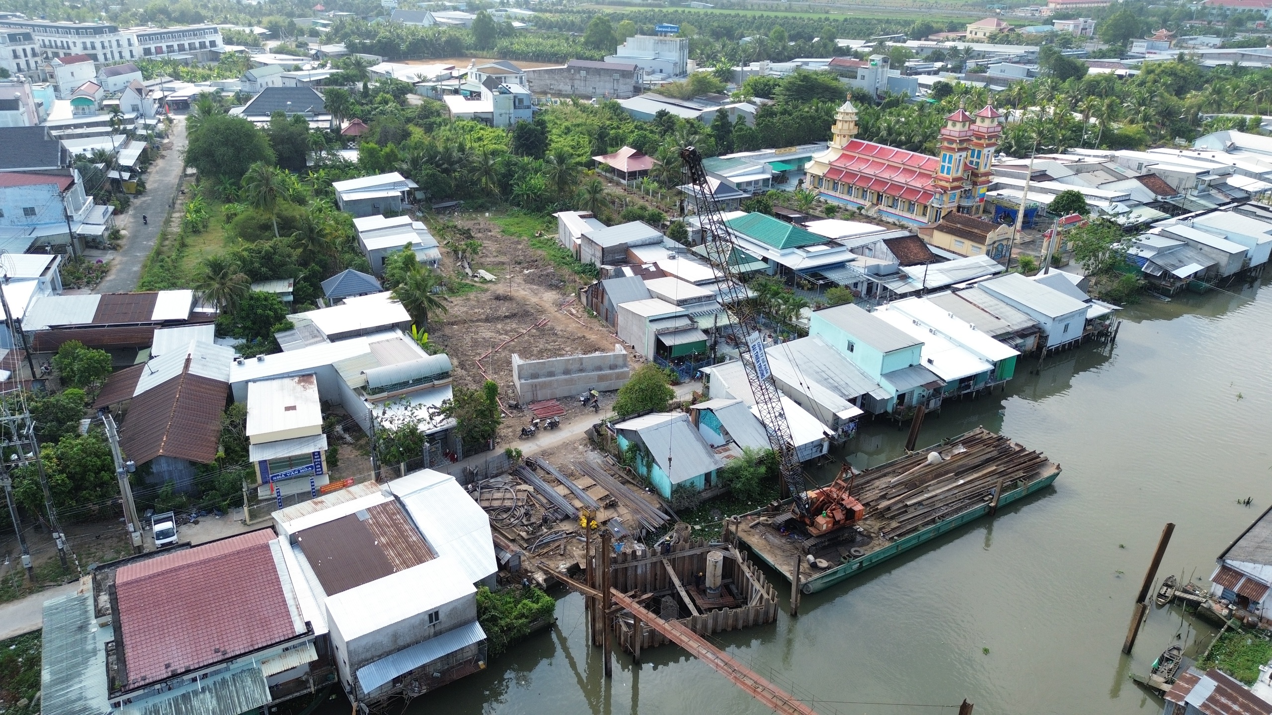 Tiến độ đạt 60% nhưng cầu Thới Lai ở Cần Thơ vẫn bị &aacute;ch tắc ở mặt bằng hai đầu đường dẫn- Ảnh 3.