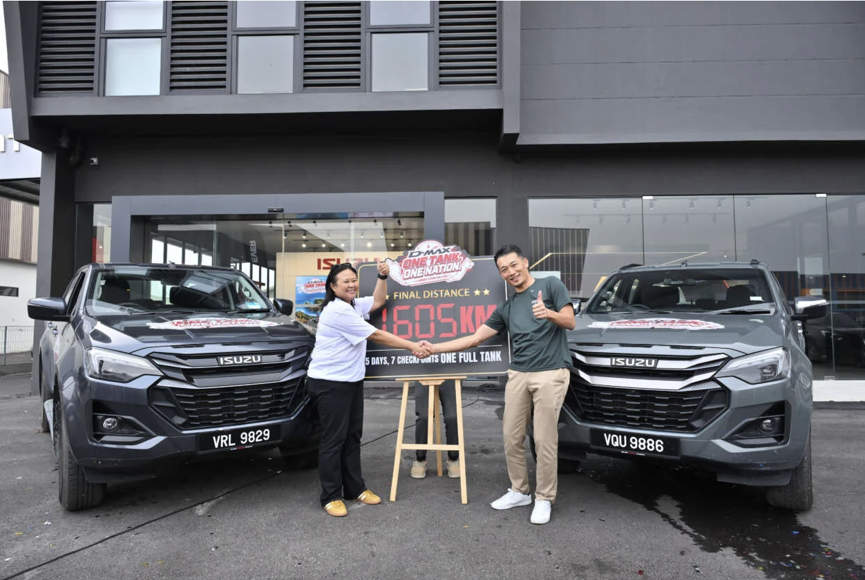 Thay động cơ mới, Isuzu D-Max đi được hơn 1.600 km với một bình dầu - Ảnh 1.
