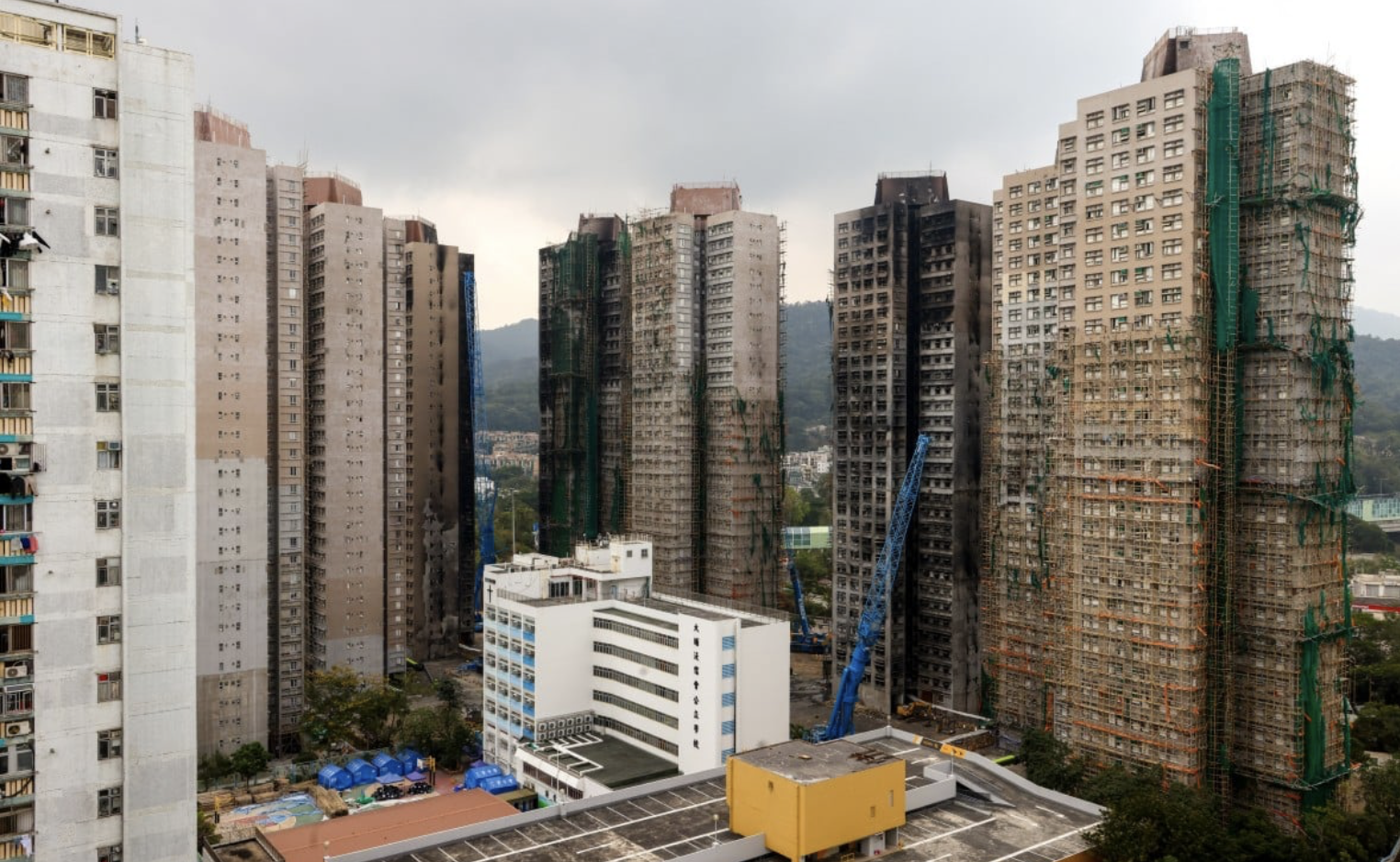 Hong Kong trợ cấp tiền thuê nhà cho nạn nhân vụ cháy chung cư đến khi có nhà mới- Ảnh 1. Hong Kong trợ cấp tiền thuê nhà cho nạn nhân vụ cháy chung cư đến khi có nhà mới- Ảnh 1.