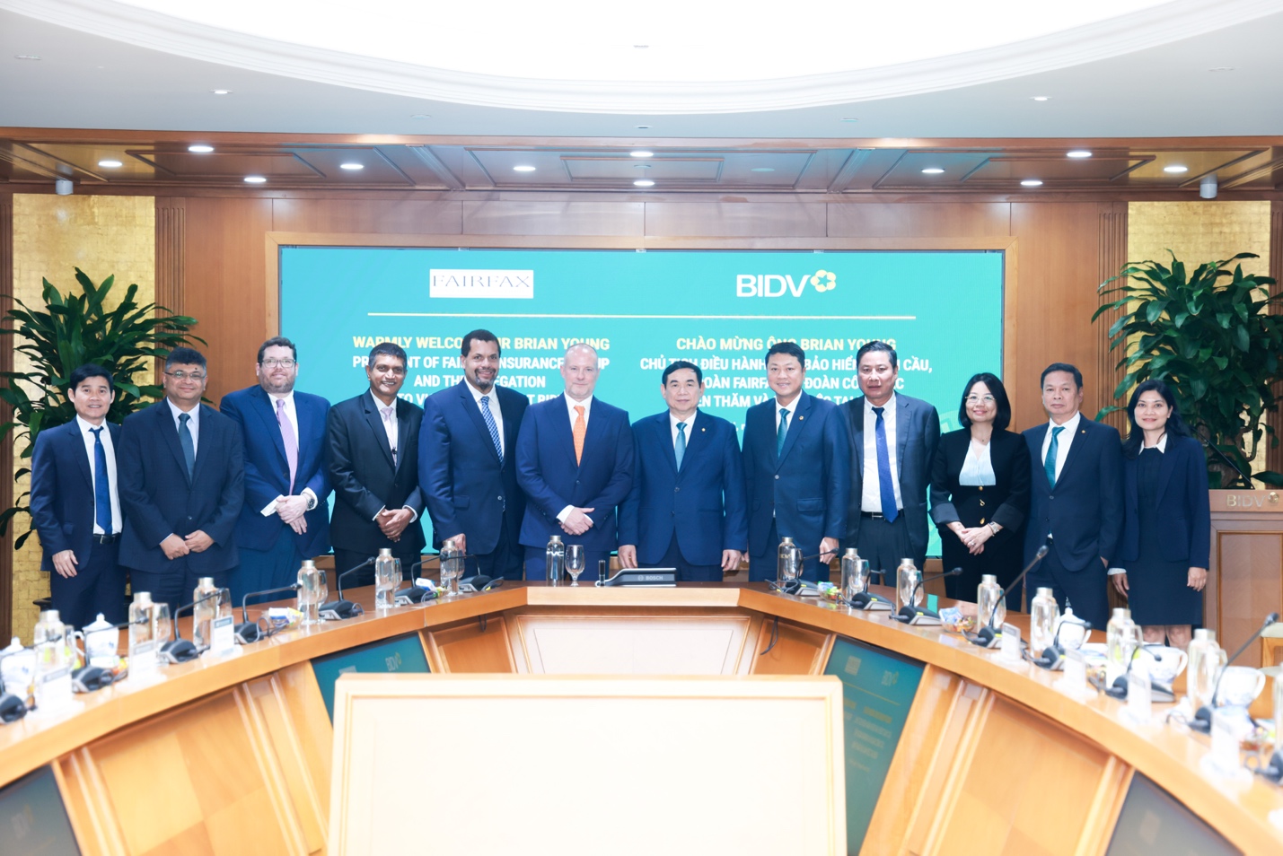 A group of people standing in front of a podium  AI-generated content may be incorrect.