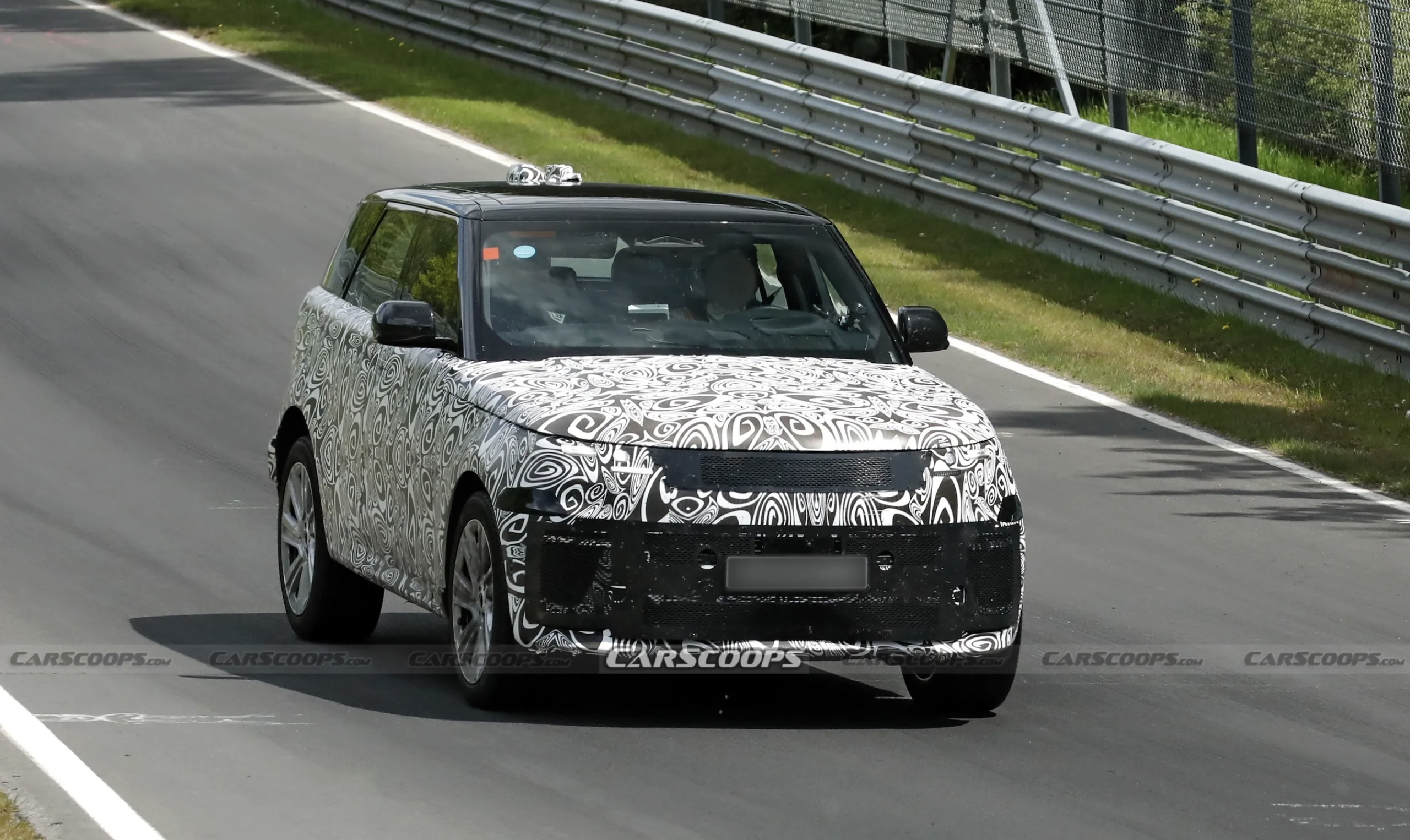 Range Rover Sport sắp có phiên bản thuần điện - Ảnh 1.