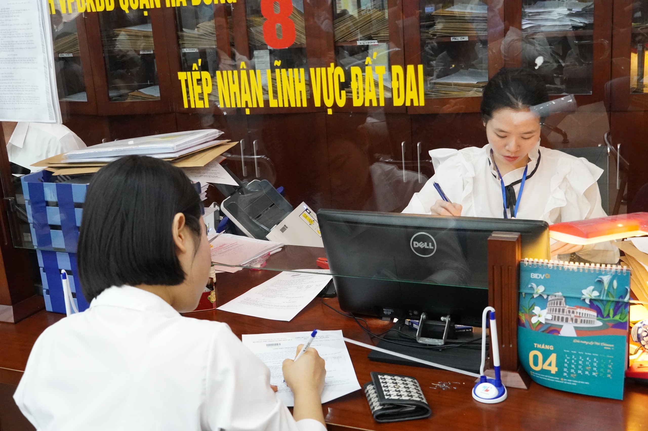 100% thủ tục đất đai thực hiện trực tuyến - Ảnh 1.