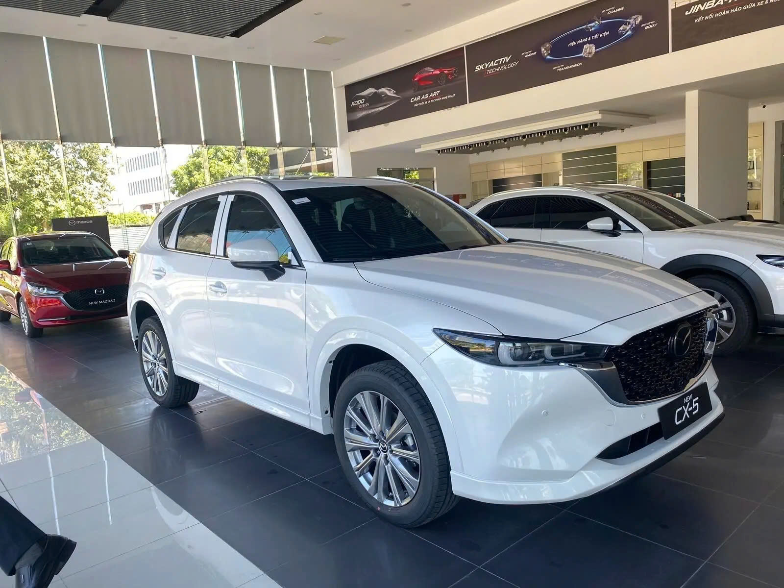 Peugeot 3008 và Mazda CX-5: Chọn công nghệ hay tính thực dụng?- Ảnh 2.