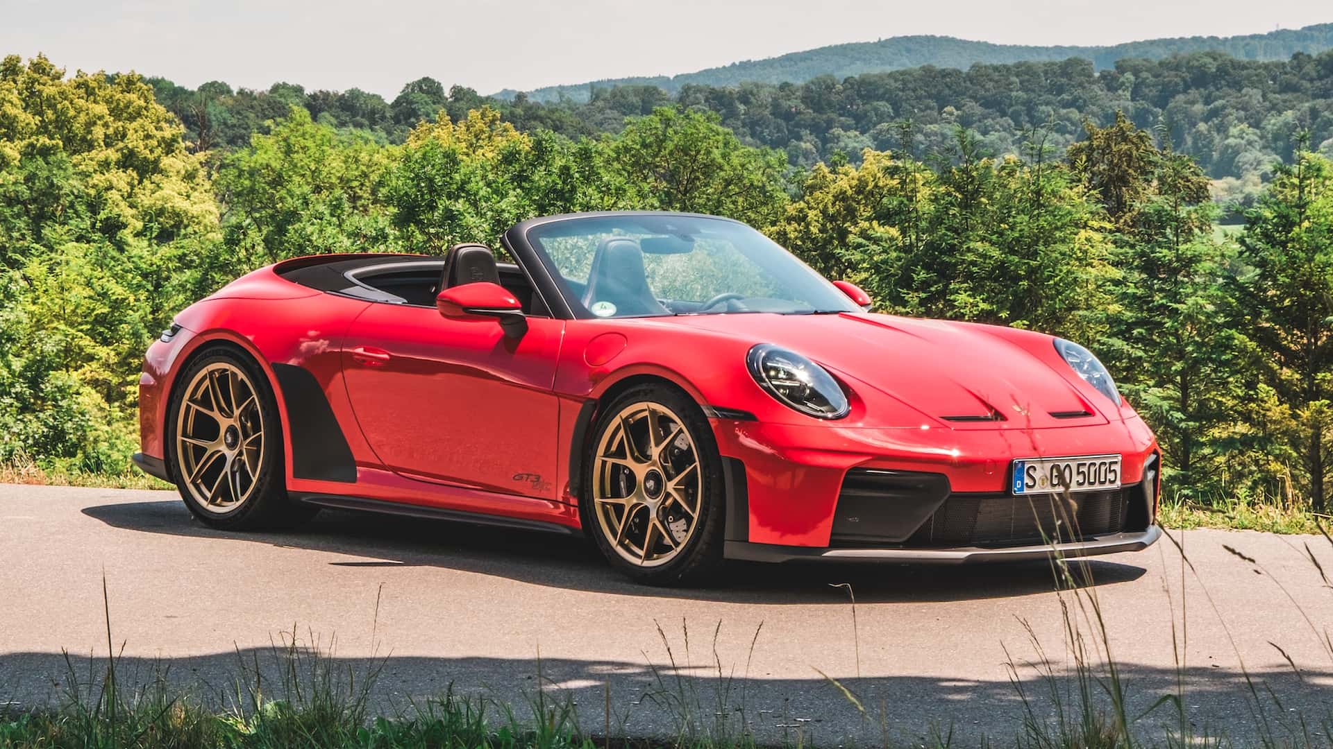 Porsche 911 GT3 lần đầu có mui trần điện - Ảnh 1.