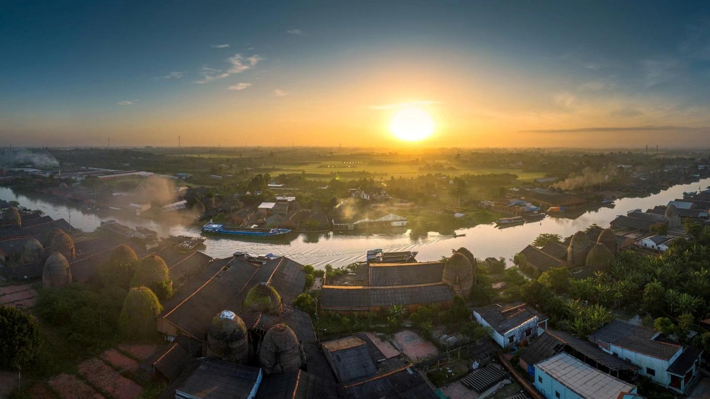 Theo dòng Cổ Chiên: Từ dòng sông mở cõi đến cách đô thị viết tiếp tương lai - Ảnh 8.