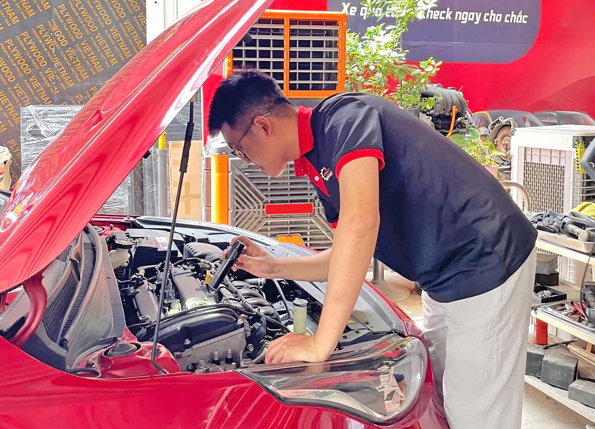 Góc khuất nghề check xe cũ - Ảnh 1.