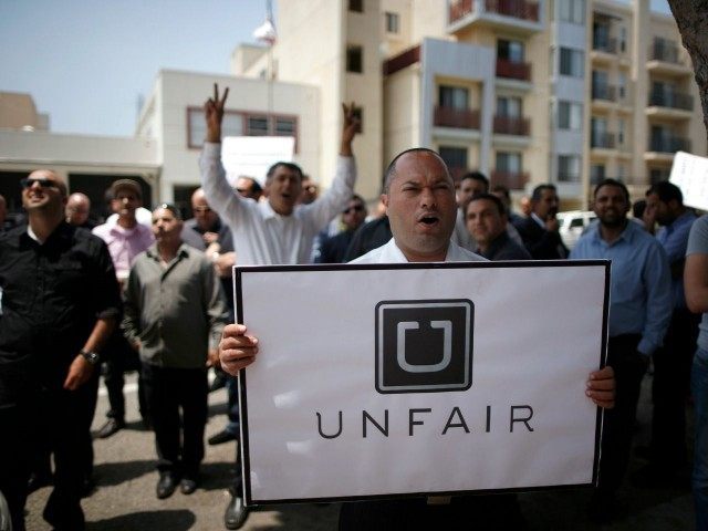Một cuộc biểu t&igrave;nh của nh&acirc;n vi&ecirc;n Uber tại Mỹ li&ecirc;n 