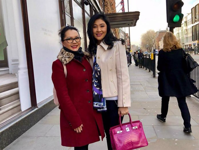 H&Igrave;nh ảnh b&agrave; Yingluck ở London