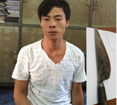 Đối tượng Nguyễn Khắc Long v&agrave; tang vật vụ &aacute;n (Ảnh: D&acirc;n Tr&iacute;)