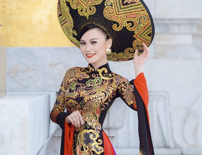 Cao Th&ugrave;y Linh v&agrave; bộ trang phục d&acirc;n tộc được trao giải tại Miss Grand International 2014