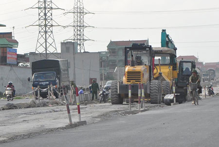 Dự &aacute;n mở rộng QL1 sẽ thi c&ocirc;ng cả trong dịp Tết &Acirc;m lịch v&agrave; dương lịch Ảnh: Xu&acirc;n Đo&agrave;n