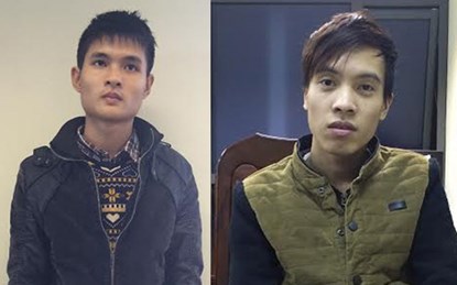 Đối tượng Đỗ Văn Dũng (tr&aacute;i) v&agrave; Nguyễn Tuấn Anh (phải) tại cơ quan c&ocirc;ng an.
