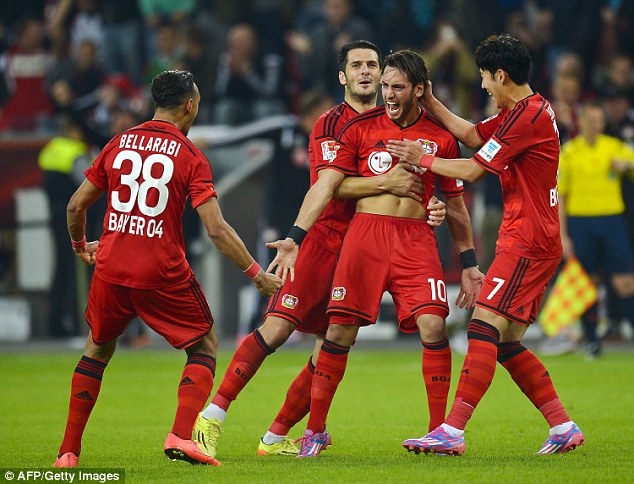 1410560699234_wps_1_Leverkusen_s_midfielder_H