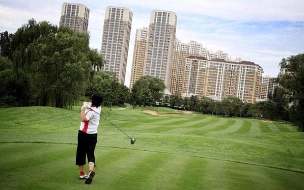 A-golfer-tees-off-at-Huatang-International-Golf-Cl