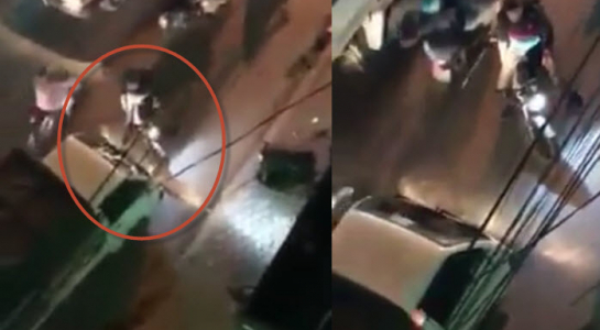 anh_tay_khong_mu_bao_hiem_chan_xe_tai_chay_nguoc_c