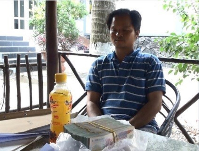 1450322376-ong-vo-van-minh-bi-bat-qu--tang-sau-khi