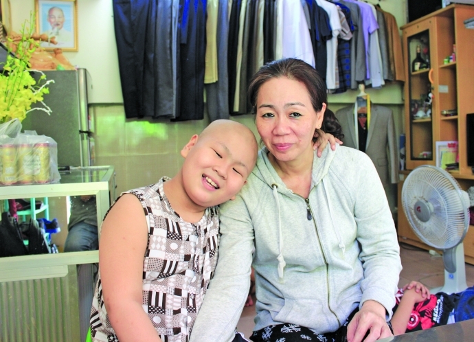 Cậu b&eacute; ung thư mơ l&agrave;m CSGT1