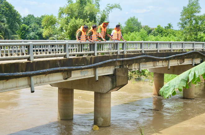 Mưa lớn cùng triều cường gây ngập nhiều khu vực tại Đồng Nai- Ảnh 15.