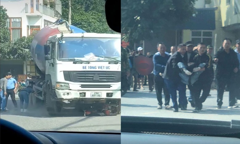Người d&acirc;n c&ugrave;ng nhau đưa nạn nh&acirc;n bị thương từ gầm xe b&ecirc; t&ocirc;ng ra ngo&agrave;i, đưa đi cấp cứu.
