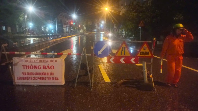 Còn 13 vị trí ngập sâu trên các tuyến quốc lộ sau bão Trami- Ảnh 1. Còn 13 vị trí ngập sâu trên các tuyến quốc lộ sau bão Trami- Ảnh 1.