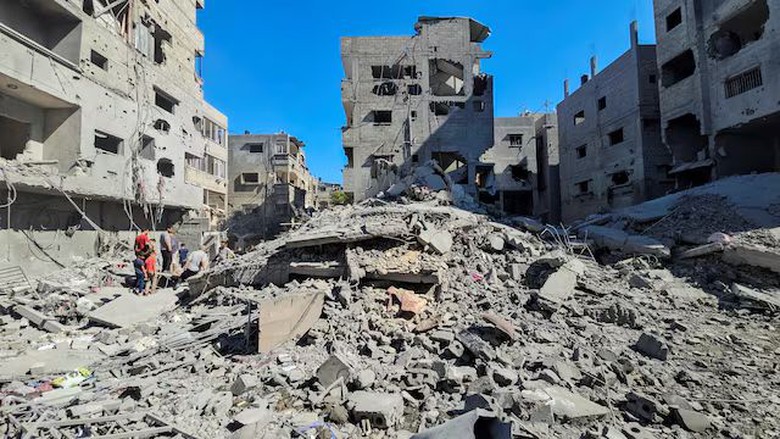 Số người thiệt mạng v&igrave; cuộc kh&ocirc;ng k&iacute;ch của Israel v&agrave;o t&ograve;a nh&agrave; cao tầng ở Gaza tăng sốc- Ảnh 1.