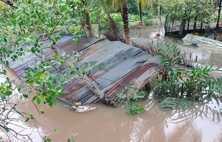 Cần Thơ đ&oacute;ng cống ngăn nước, nhiều tuyến đường ngập s&acirc;u- Ảnh 2.