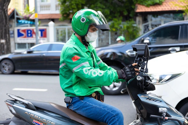 Ph&iacute;a sau th&agrave;nh c&ocirc;ng của Grab sau một thập kỷ tại Việt Nam- Ảnh 1.