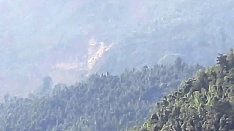 Đang điều tra nguy&ecirc;n nh&acirc;n vụ nổ tr&ecirc;n đỉnh n&uacute;i L&agrave;ng Nủ- Ảnh 1.