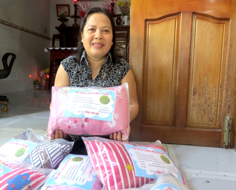 Nghị lực nữ thợ may sau biến cố cuộc đời- Ảnh 2.